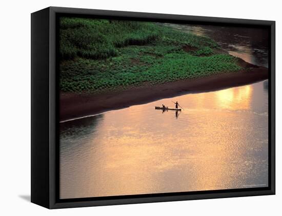 Sunset on Karo Men in a Dugout Raft, Omo River, Ethiopia-Janis Miglavs-Framed Premier Image Canvas