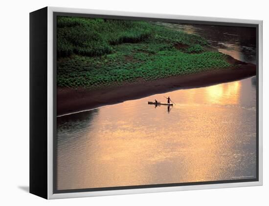 Sunset on Karo Men in a Dugout Raft, Omo River, Ethiopia-Janis Miglavs-Framed Premier Image Canvas