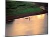 Sunset on Karo Men in a Dugout Raft, Omo River, Ethiopia-Janis Miglavs-Mounted Photographic Print