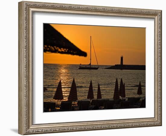 Sunset on Sailboat, Lighthouse and Umbrellas, Kusadasi, Turkey-Joe Restuccia III-Framed Photographic Print