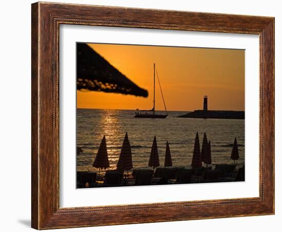 Sunset on Sailboat, Lighthouse and Umbrellas, Kusadasi, Turkey-Joe Restuccia III-Framed Photographic Print