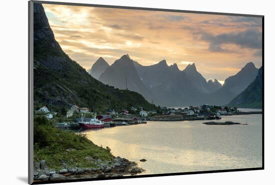 Sunset on the Fishing Village Surrounded by Rocky Peaks and Sea, Reine, Nordland County-Roberto Moiola-Mounted Photographic Print