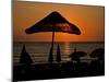 Sunset on Umbrellas, Kusadasi, Turkey-Joe Restuccia III-Mounted Photographic Print