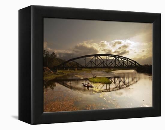 Sunset Over a Bridge in Da Nang with a Small Fisherman's Boat-Alex Saberi-Framed Premier Image Canvas