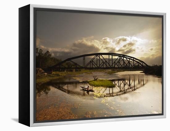 Sunset Over a Bridge in Da Nang with a Small Fisherman's Boat-Alex Saberi-Framed Premier Image Canvas