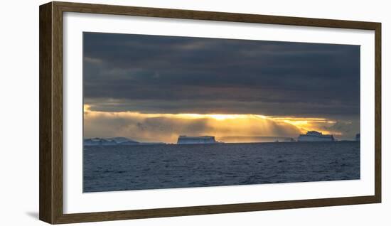 Sunset over icebergs, Antarctica-Art Wolfe-Framed Photographic Print