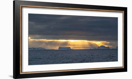 Sunset over icebergs, Antarctica-Art Wolfe-Framed Photographic Print