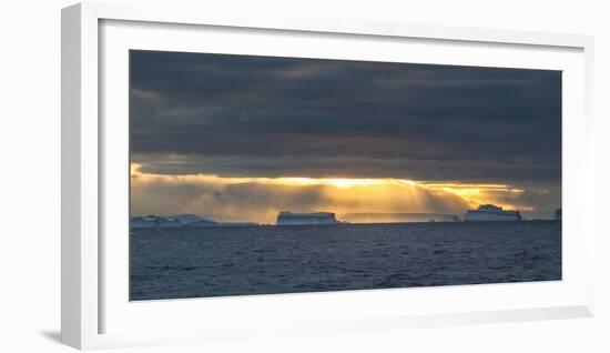 Sunset over icebergs, Antarctica-Art Wolfe-Framed Photographic Print