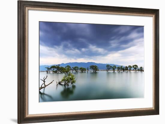 Sunset over one of the many lakes in the village of Heqing in Yunnan, China-ClickAlps-Framed Photographic Print