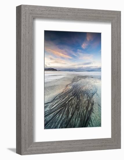 Sunset over the black sand of Skagsanden beach covered with ice in winter, Flakstad-Roberto Moiola-Framed Photographic Print