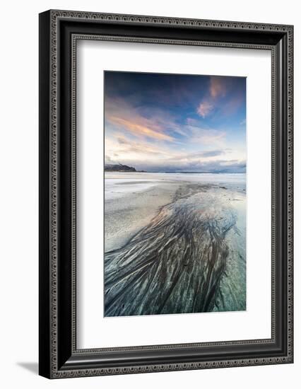 Sunset over the black sand of Skagsanden beach covered with ice in winter, Flakstad-Roberto Moiola-Framed Photographic Print