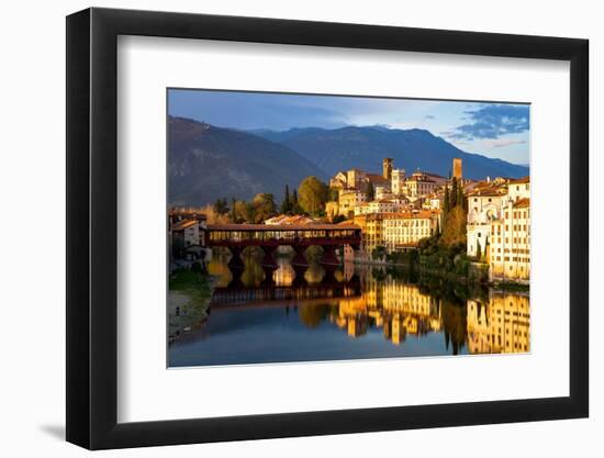 Sunset over the iconic Ponte Vecchio bridge reflected in river Brenta, Bassano Del Grappa-Roberto Moiola-Framed Photographic Print