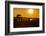 Sunset over the lake near wooden footbridge, Myanmar.-Michele Niles-Framed Photographic Print