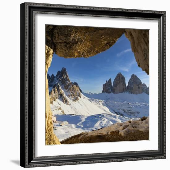 Sunset over the snow capped Tre Cime di Lavaredo and Monte Paterno seen from rock cave-Roberto Moiola-Framed Photographic Print
