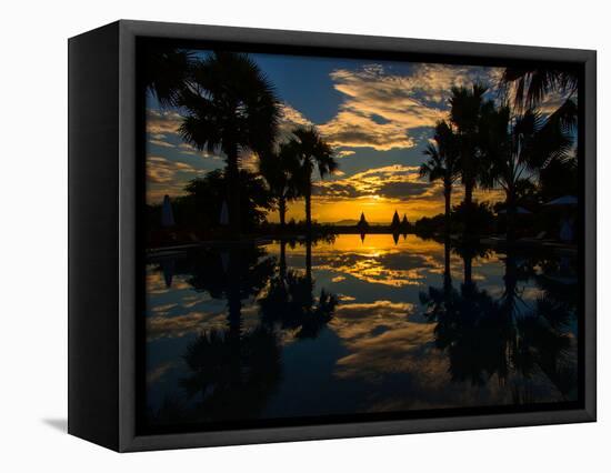 Sunset reflected in the infinity pool at Aureum Palace Hotel, Bagan, Mandalay Region, Myanmar-null-Framed Premier Image Canvas