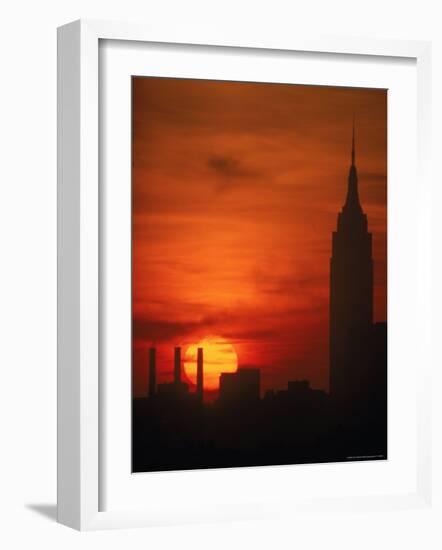 Sunset View with the Empire State Building-Alfred Eisenstaedt-Framed Photographic Print