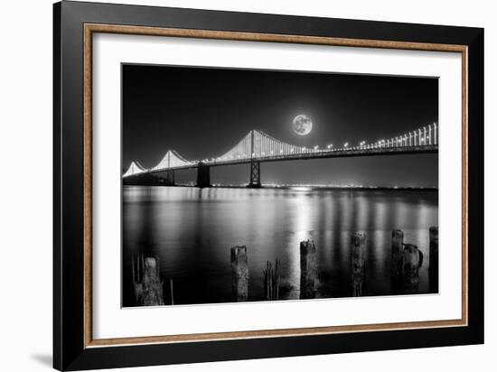 Super full moon rising in San Francisco Embarcadero pier over the Bay Bridge in the evening-David Chang-Framed Photographic Print