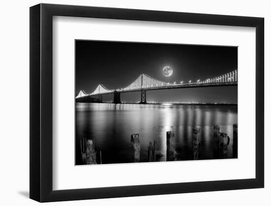 Super full moon rising in San Francisco Embarcadero pier over the Bay Bridge in the evening-David Chang-Framed Photographic Print