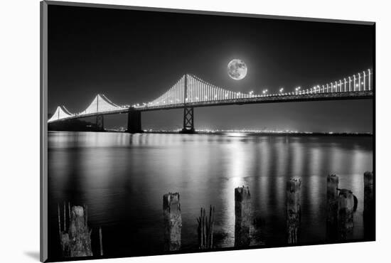 Super full moon rising in San Francisco Embarcadero pier over the Bay Bridge in the evening-David Chang-Mounted Photographic Print