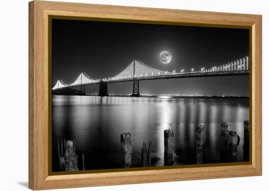 Super full moon rising in San Francisco Embarcadero pier over the Bay Bridge in the evening-David Chang-Framed Premier Image Canvas