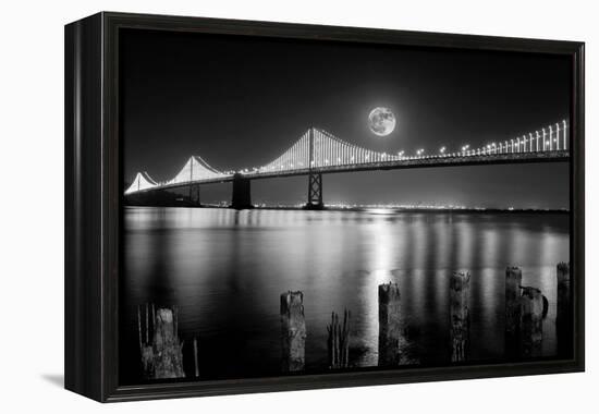 Super full moon rising in San Francisco Embarcadero pier over the Bay Bridge in the evening-David Chang-Framed Premier Image Canvas
