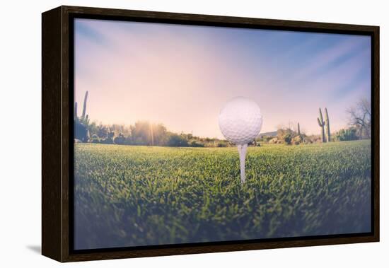 Super Wide Angle View of Golf Ball on Tee with Desert Fairway and Stunning Arizona Sunset in Backgr-BCFC-Framed Premier Image Canvas