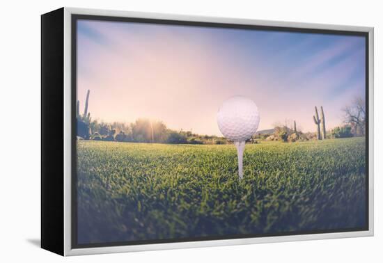 Super Wide Angle View of Golf Ball on Tee with Desert Fairway and Stunning Arizona Sunset in Backgr-BCFC-Framed Premier Image Canvas