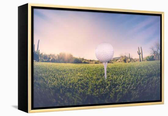 Super Wide Angle View of Golf Ball on Tee with Desert Fairway and Stunning Arizona Sunset in Backgr-BCFC-Framed Premier Image Canvas