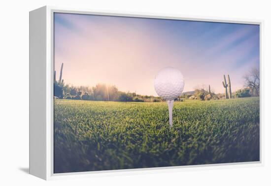 Super Wide Angle View of Golf Ball on Tee with Desert Fairway and Stunning Arizona Sunset in Backgr-BCFC-Framed Premier Image Canvas