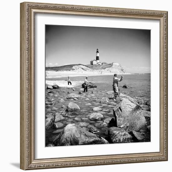 Surf Casting Fishermen Working the Shore Near the Historic Montauk Point Lighthouse-Alfred Eisenstaedt-Framed Photographic Print