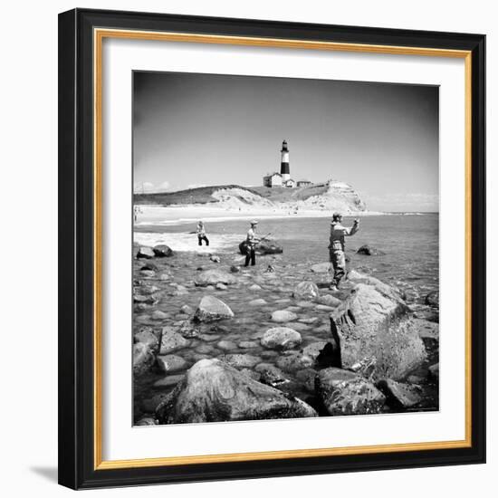 Surf Casting Fishermen Working the Shore Near the Historic Montauk Point Lighthouse-Alfred Eisenstaedt-Framed Photographic Print