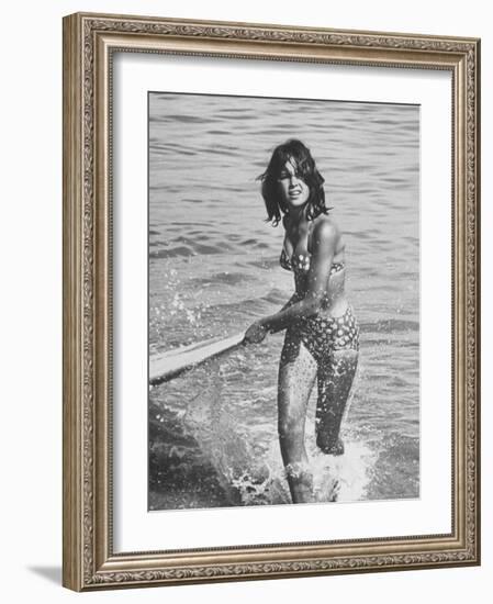 Surf Rider Returning After Surfing-Allan Grant-Framed Photographic Print