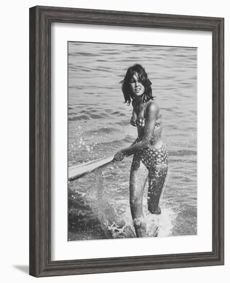 Surf Rider Returning After Surfing-Allan Grant-Framed Photographic Print