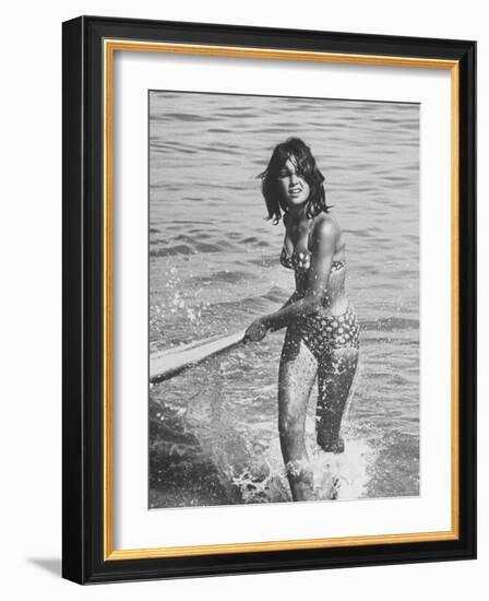 Surf Rider Returning After Surfing-Allan Grant-Framed Photographic Print