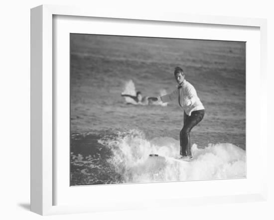 Surfer Riding a Wave While Wearing a Tuxedo-Allan Grant-Framed Photographic Print