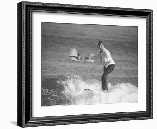 Surfer Riding a Wave While Wearing a Tuxedo-Allan Grant-Framed Photographic Print