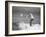 Surfer Riding a Wave While Wearing a Tuxedo-Allan Grant-Framed Photographic Print