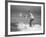 Surfer Riding a Wave While Wearing a Tuxedo-Allan Grant-Framed Photographic Print