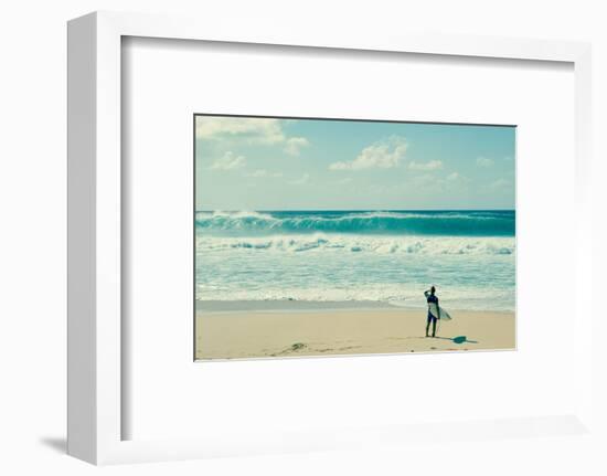 Surfer standing on the beach, North Shore, Oahu, Hawaii, USA-null-Framed Photographic Print