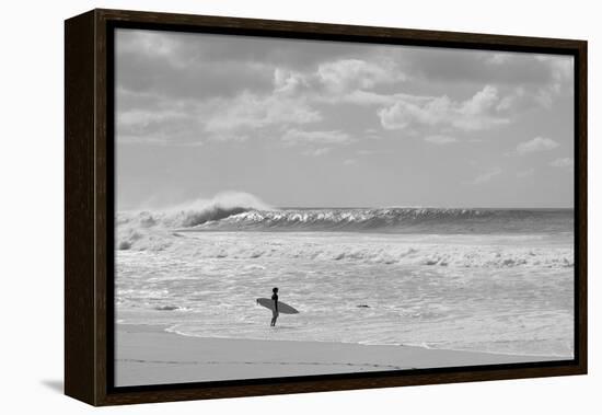 Surfer standing on the beach, North Shore, Oahu, Hawaii, USA-null-Framed Premier Image Canvas