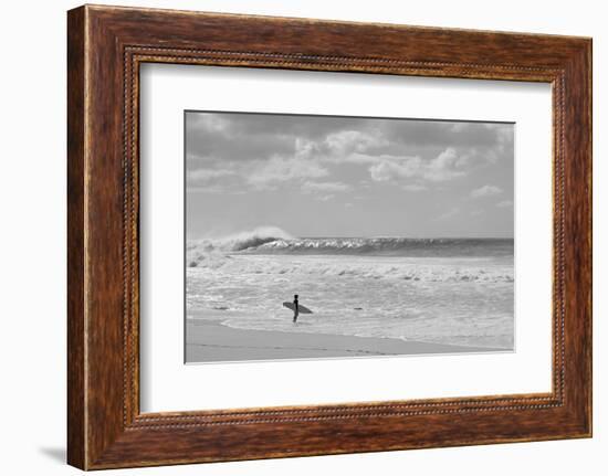 Surfer standing on the beach, North Shore, Oahu, Hawaii, USA-null-Framed Photographic Print