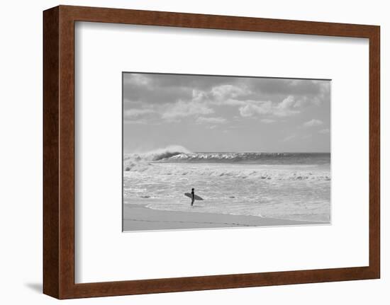 Surfer standing on the beach, North Shore, Oahu, Hawaii, USA-null-Framed Photographic Print