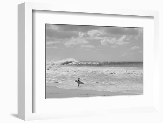 Surfer standing on the beach, North Shore, Oahu, Hawaii, USA-null-Framed Photographic Print