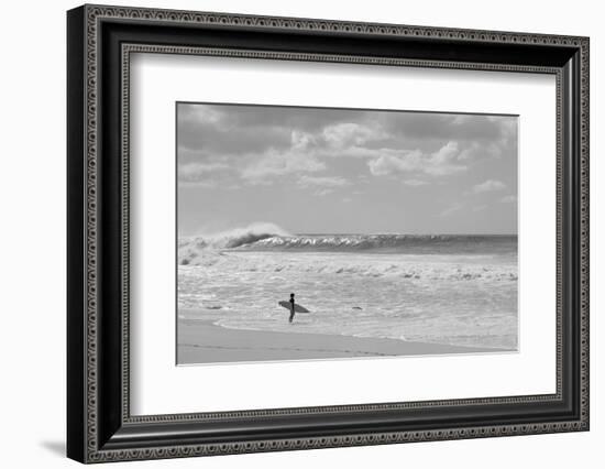 Surfer standing on the beach, North Shore, Oahu, Hawaii, USA-null-Framed Photographic Print