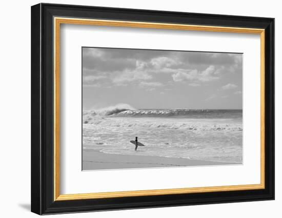 Surfer standing on the beach, North Shore, Oahu, Hawaii, USA-null-Framed Premium Photographic Print