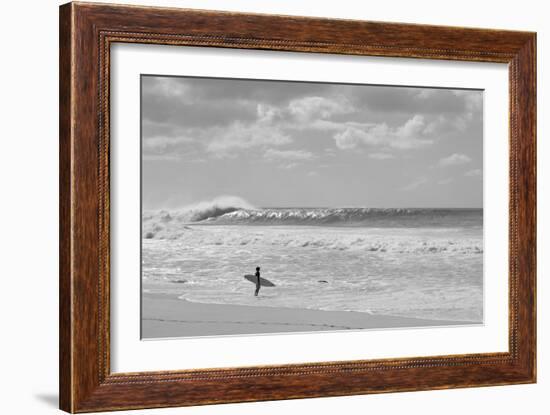 Surfer standing on the beach, North Shore, Oahu, Hawaii, USA-null-Framed Photographic Print