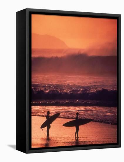 Surfers at Sunset, Oahu, Hawaii-Bill Romerhaus-Framed Premier Image Canvas