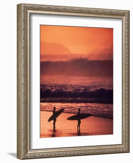 Surfers at Sunset, Oahu, Hawaii-Bill Romerhaus-Framed Photographic Print