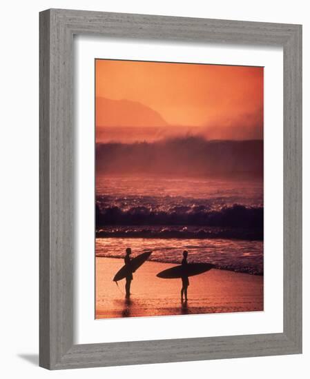 Surfers at Sunset, Oahu, Hawaii-Bill Romerhaus-Framed Photographic Print