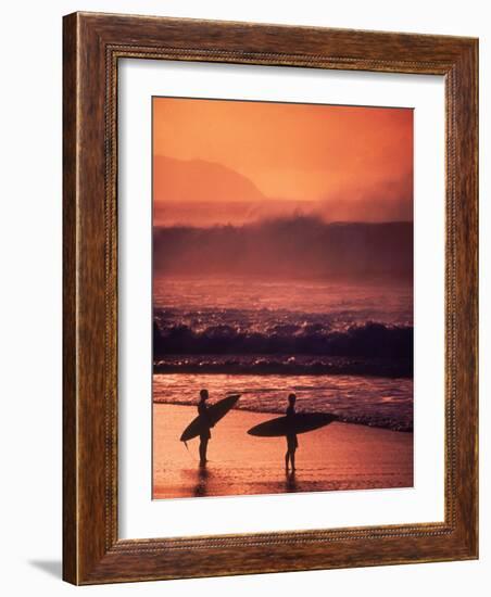 Surfers at Sunset, Oahu, Hawaii-Bill Romerhaus-Framed Photographic Print